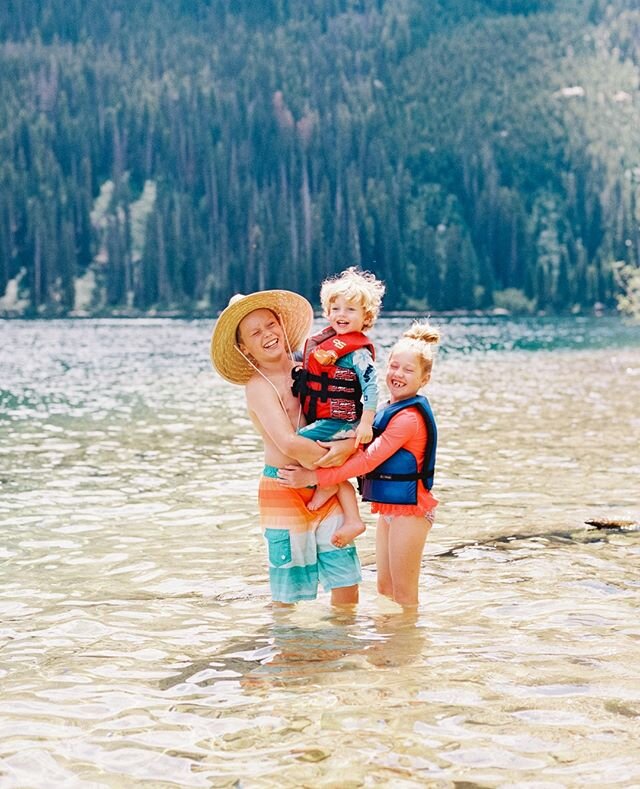The silver lining... More family time. I cherish my weekends with my babies. ⁠
⁠
This is one of my favorite photos of my kids, in one of my favorite places, Redfish Lake Idaho. Last summer in Idaho we ventured up to Redfish for the day and I brought my film camera and only one roll of film. I challenged myself to capture the day in just 16 photos (one roll). It was very hard because I tend to overshoot ;) but it's the best lesson in patience and appreciation. ⁠
⁠
Ultimately it was the perfect day and every photo is one to remember ;) but this one is my absolute favorite! Their eyes are shut from laughter and the tiniest one knows he runs the show. I look forward to these moments. ⁠
⁠
Film Scans @photovisionprints ⁠