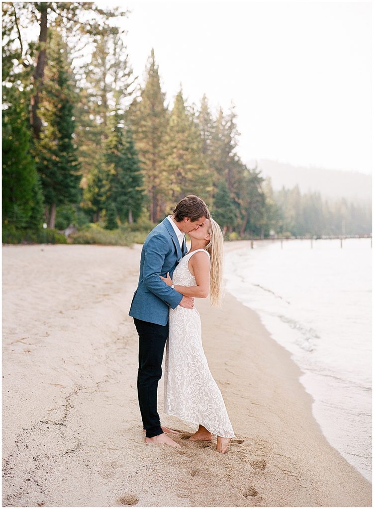 bride and groom on beach in Lake Tahoe